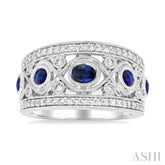 4x3 MM Oval, 2.8 MM and 2.4 MM Round Cut Sapphire and 3/8 Ctw Criss-Cross Framework Single Cut Diamond Precious Band in 14K White Gold